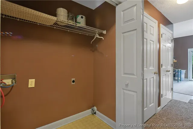 a view of a room with racks on the wall