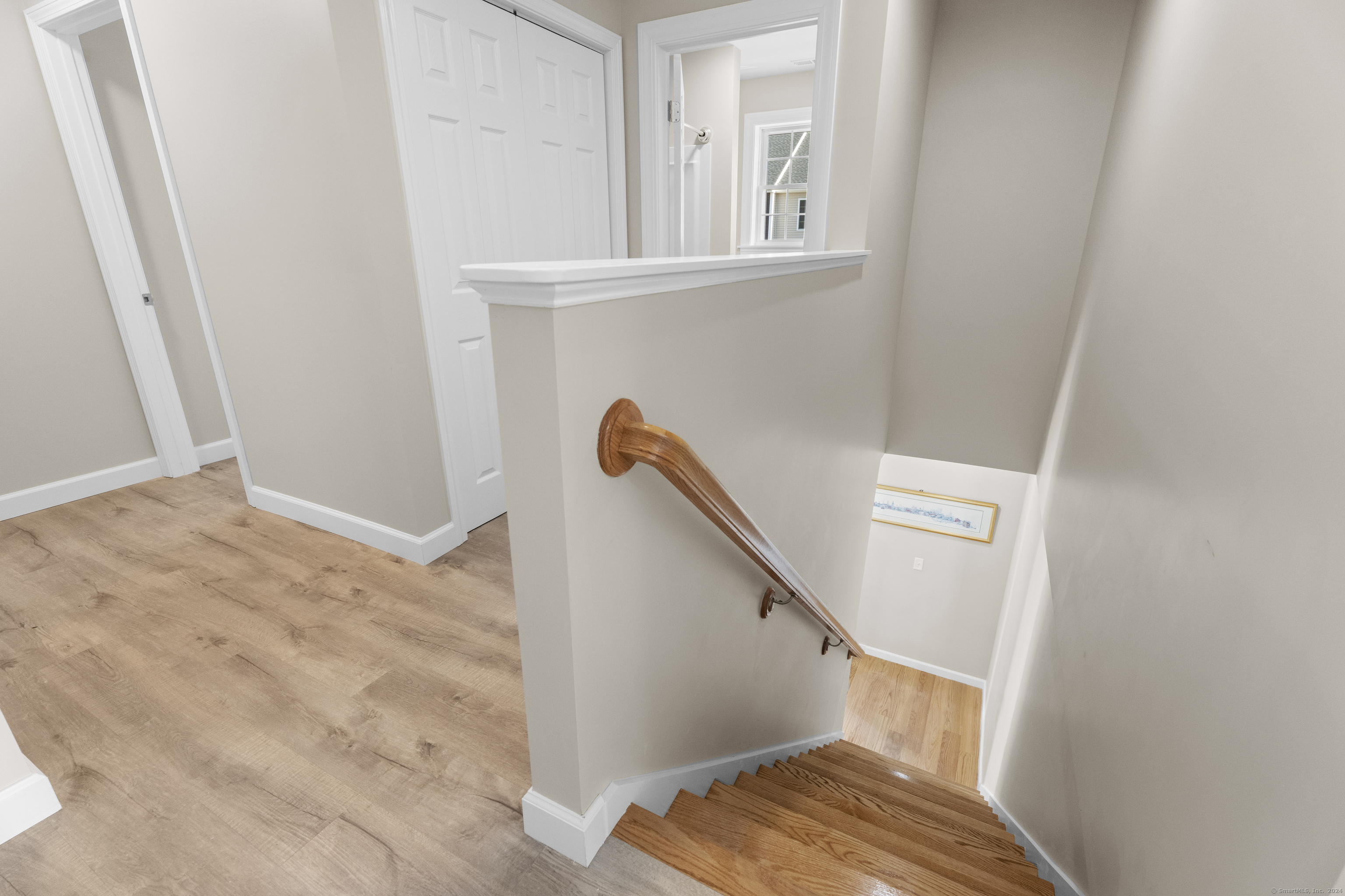 205 Winding Hollow Road Groton, CT 06340 - Photo 16 of 20 a view of staircase with white walls