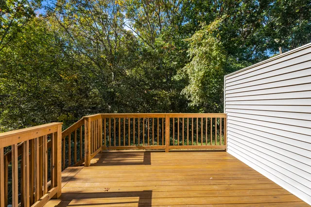 a view of staircase with white walls