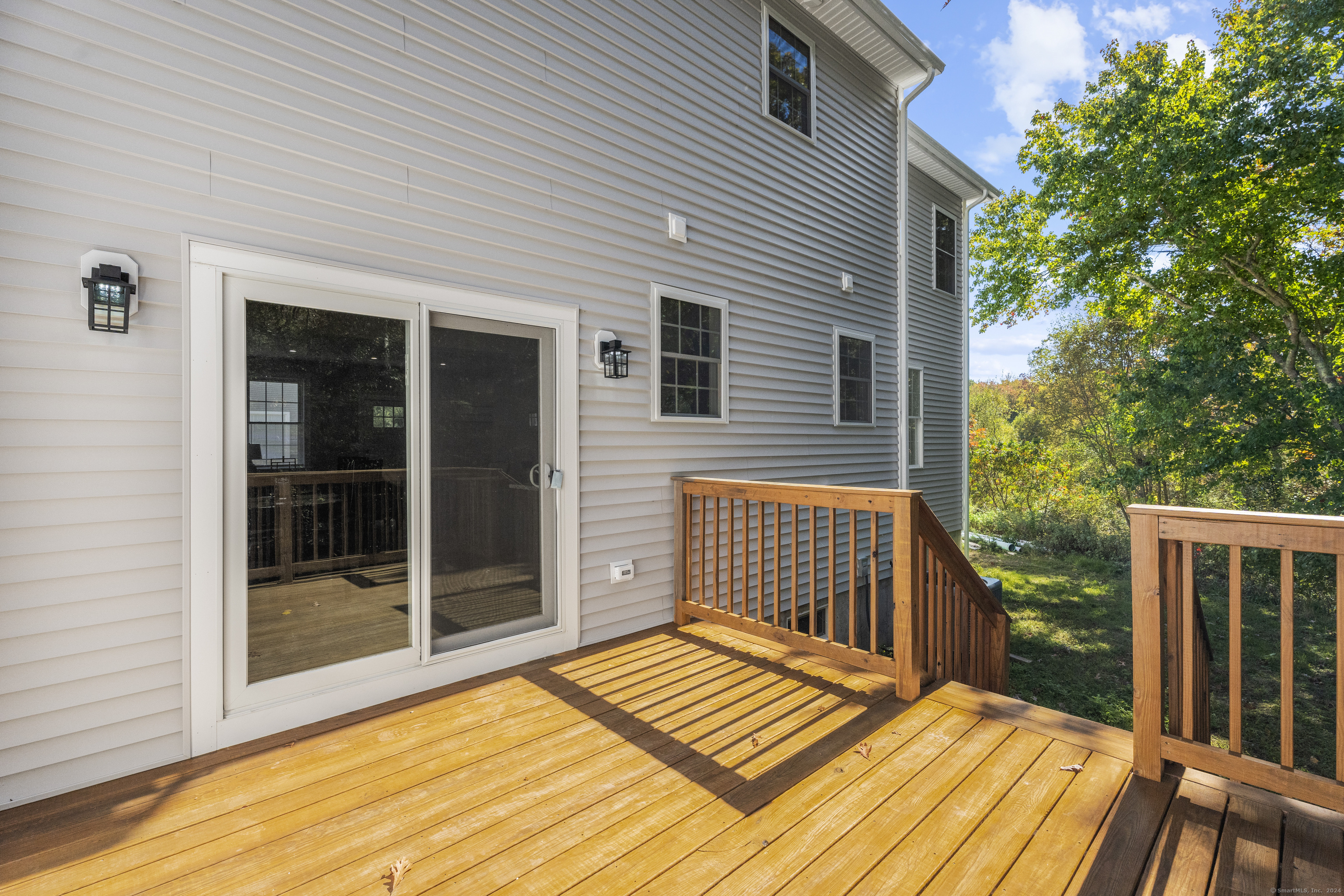205 Winding Hollow Road Groton, CT 06340 - Photo 18 of 20 a view of outdoor space and deck