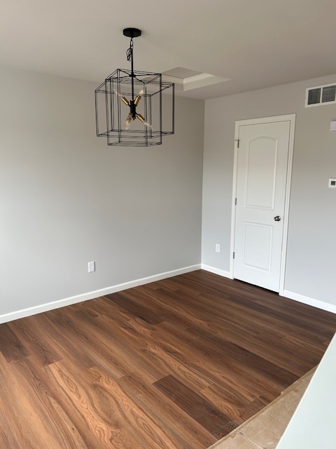 79.2 Periwinkle Court Morris, IL 60450 - Photo 11 of 12 a view of a room with wooden floor