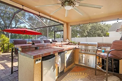 a view of a kitchen with a table and chairs