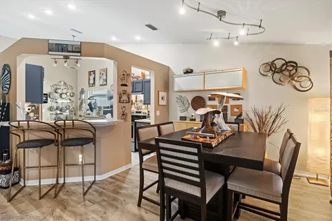 a view of a dining room with furniture