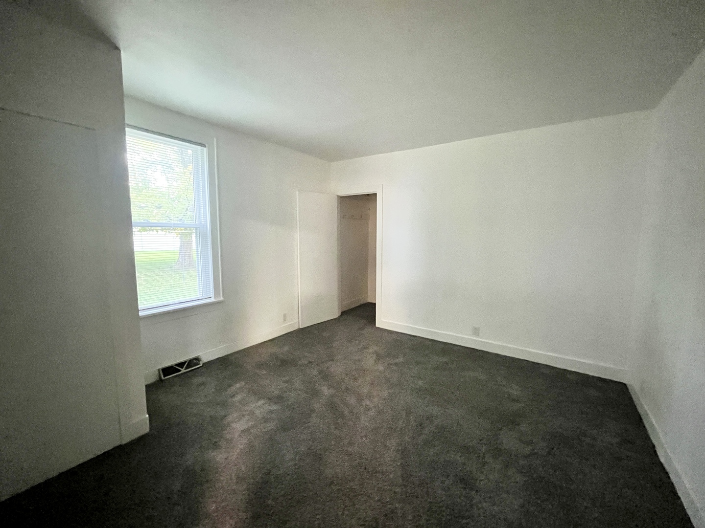 41W654 Main Street Road Elburn, IL 60119 - Photo 16 of 18 an empty room with a empty space and windows