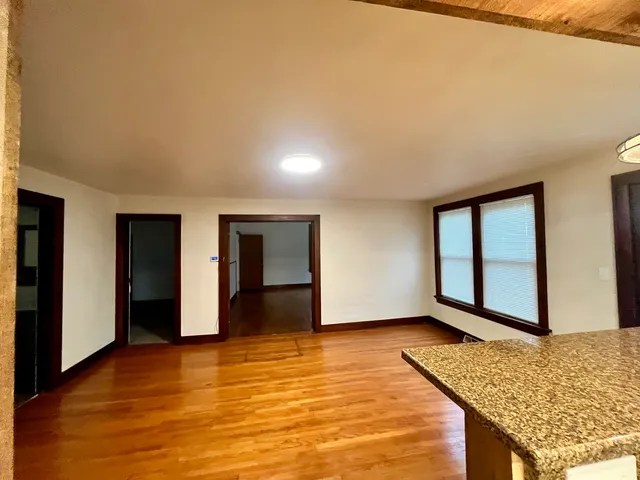 a view of an empty room and window