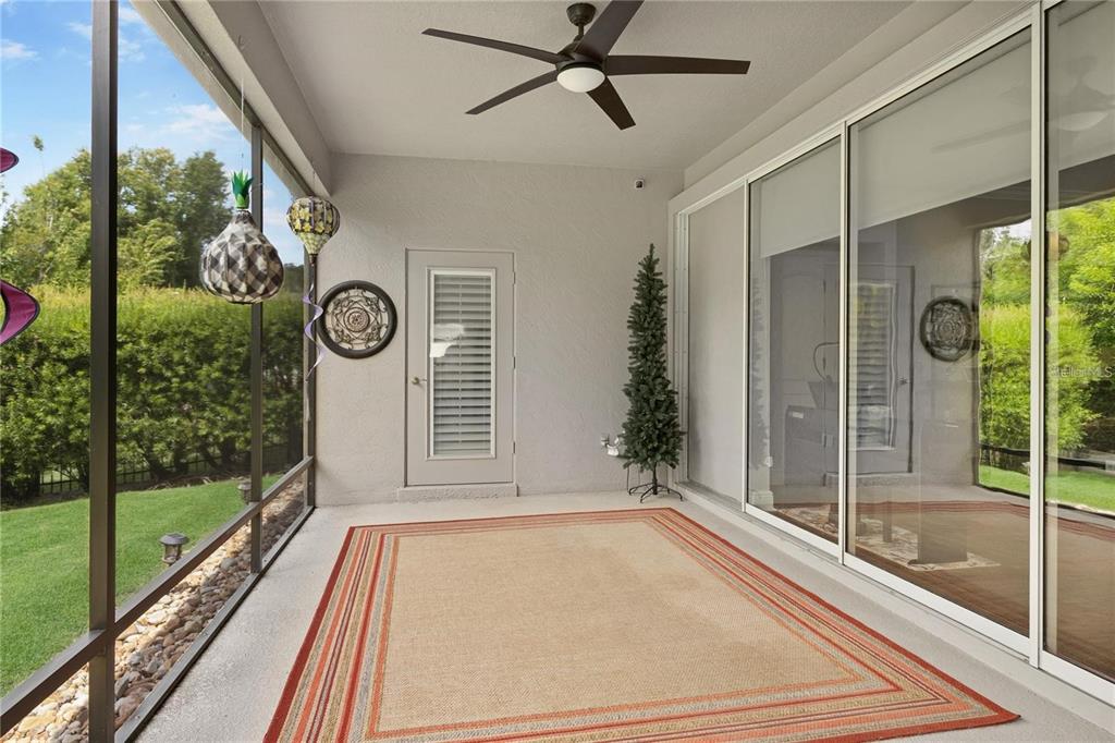 1923 Banning Beach Road Tavares, FL 32778 - Photo 34 of 44 a view of a balcony with door and wooden floor