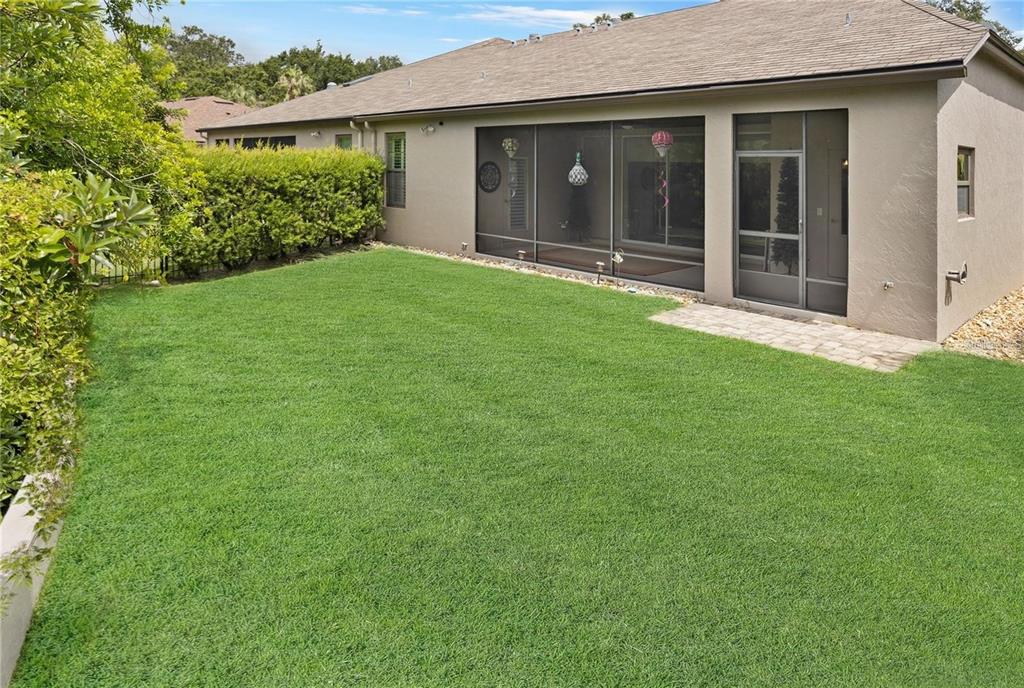 1923 Banning Beach Road Tavares, FL 32778 - Photo 35 of 44 a view of a house with a garden