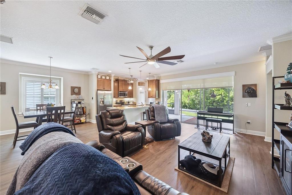 1923 Banning Beach Road Tavares, FL 32778 - Photo 5 of 44 a living room with furniture and a large window
