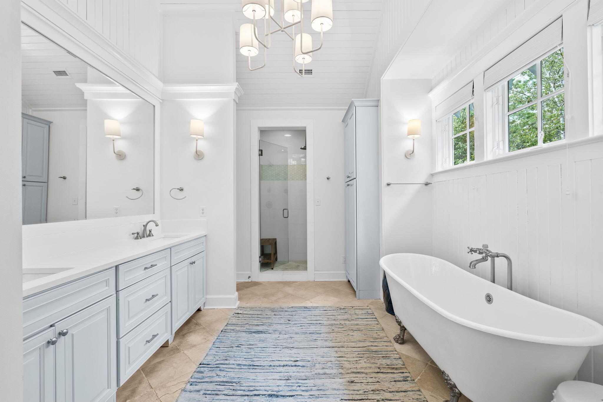 19 Creek Bridge Way Watersound, FL 32461 - Photo 14 of 35 a spacious bathroom with a double vanity sink a large mirror and a bathtub