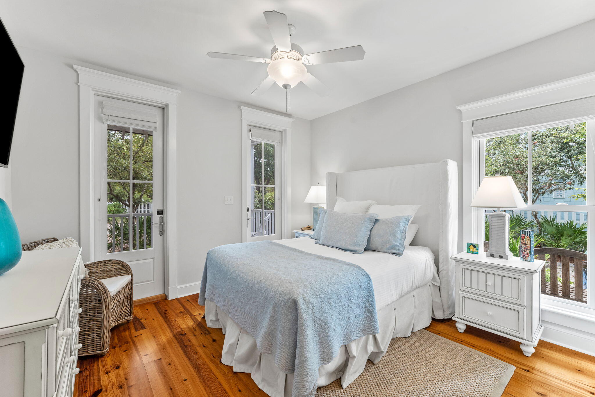 19 Creek Bridge Way Watersound, FL 32461 - Photo 17 of 35 a bedroom with a bed and a chandelier