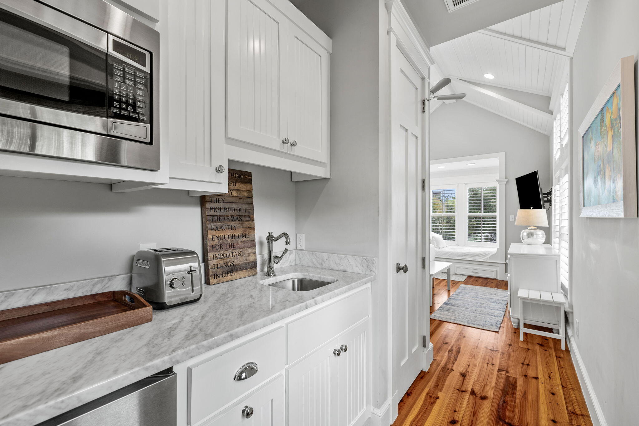 19 Creek Bridge Way Watersound, FL 32461 - Photo 27 of 35 a kitchen with a sink and cabinets