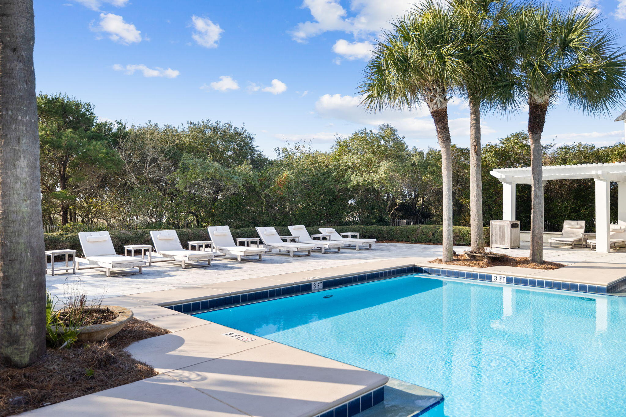 19 Creek Bridge Way Watersound, FL 32461 - Photo 31 of 35 a view of a swimming pool with chairs