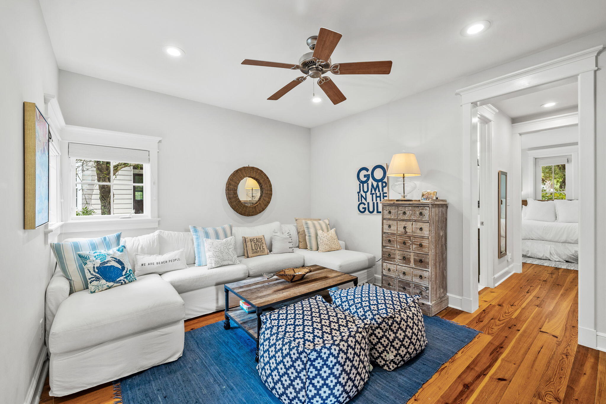 19 Creek Bridge Way Watersound, FL 32461 - Photo 5 of 35 a living room with furniture a window and a chandelier