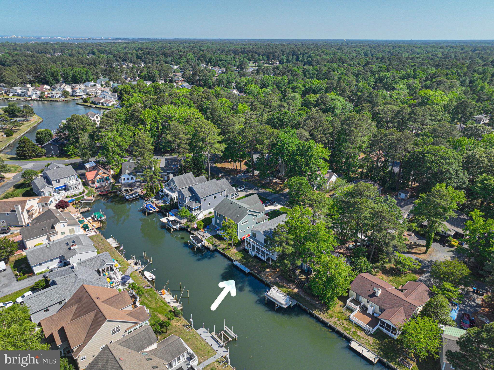 8 Grand Port Road Ocean Pines, MD 21811 - Photo 13 of 18 an aerial view of residential houses with outdoor space and trees