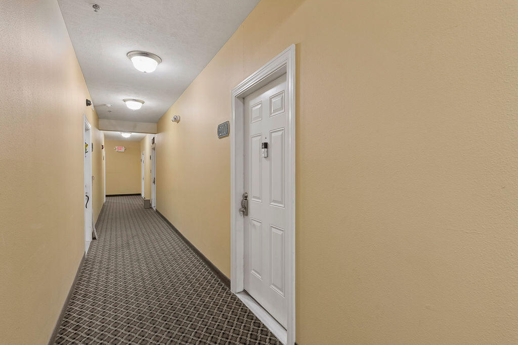180 Grace Chapel Road, Unit 210 Blue Eye, MO 65611 - Photo 3 of 21 2nd floor hall to condo #210