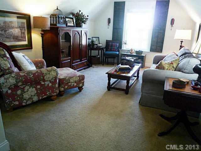 86599 Arrington Road Lancaster, SC 29720 - Photo 14 of 16 a living room with furniture and a flat screen tv