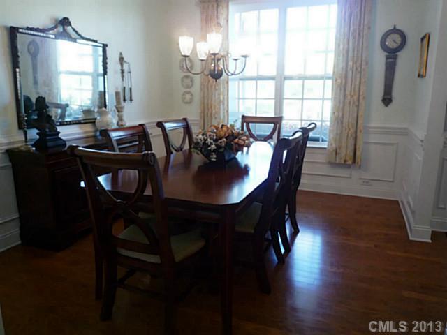 86599 Arrington Road Lancaster, SC 29720 - Photo 7 of 16 a view of a a dining room with furniture window and wooden floor