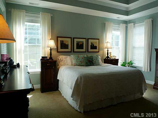 86599 Arrington Road Lancaster, SC 29720 - Photo 8 of 16 a bedroom with a bed and a window