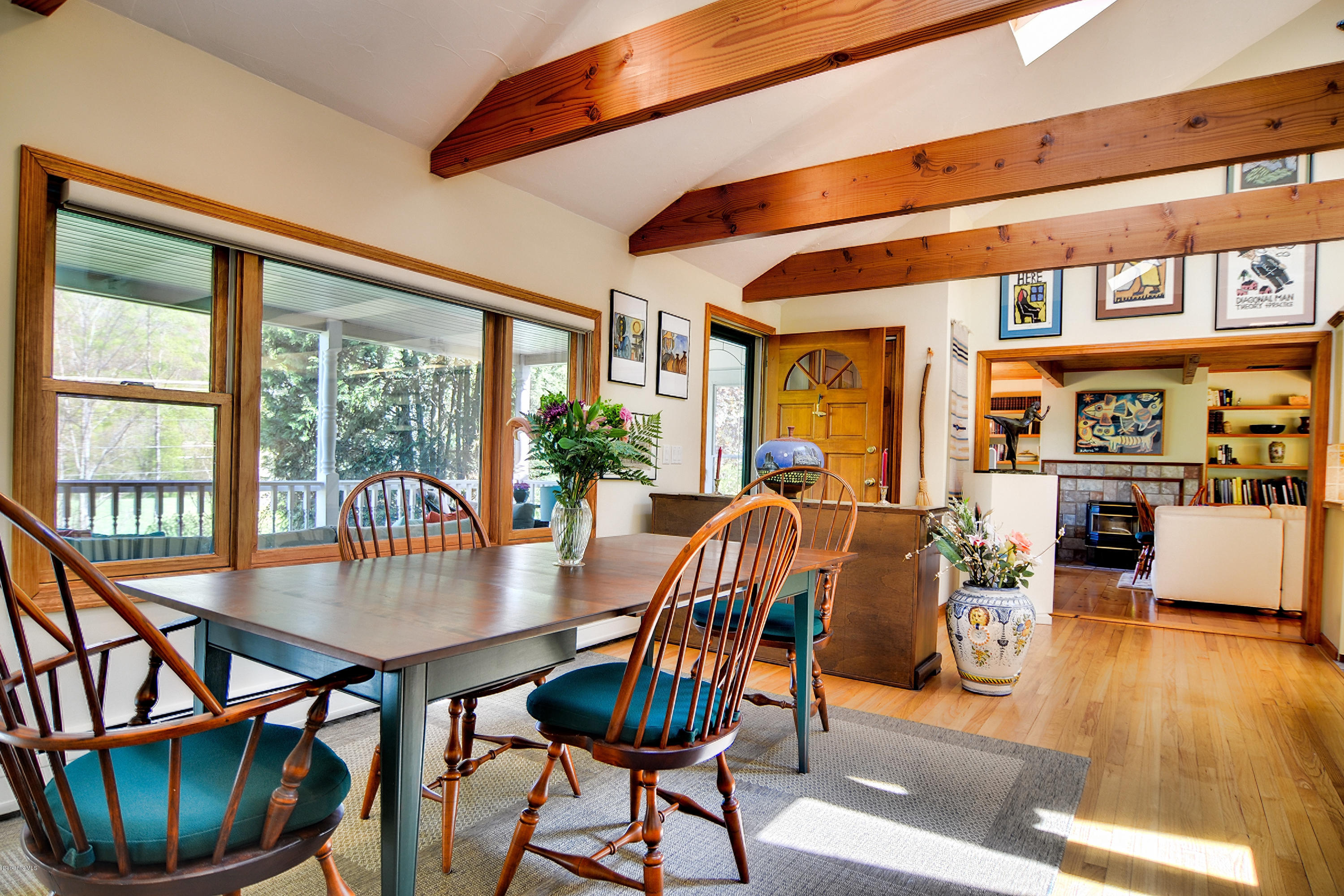 2231 Hancock Road Hancock, MA 01267 - Photo 12 of 39 a view of a dining room with furniture and wooden floor