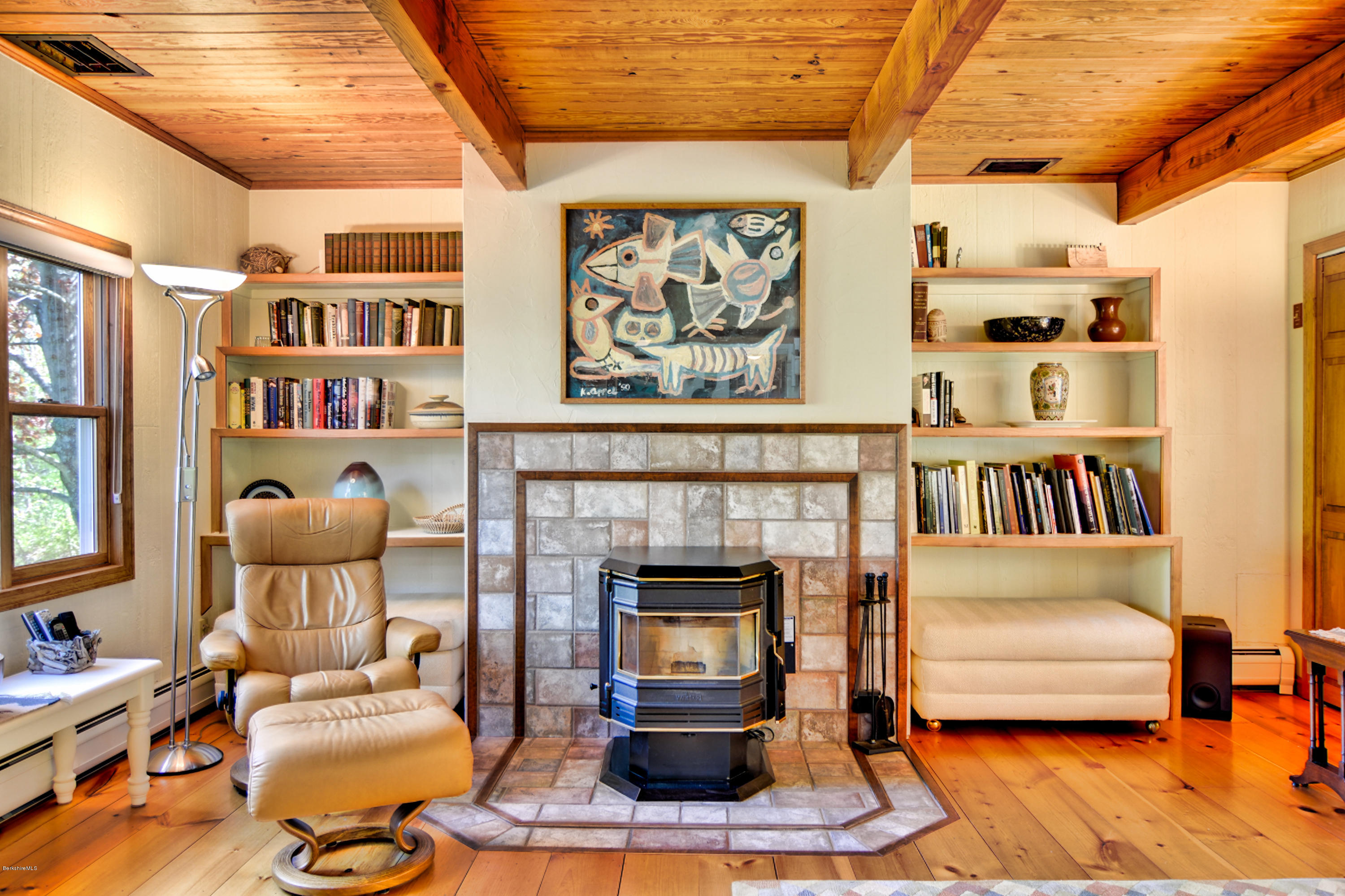 2231 Hancock Road Hancock, MA 01267 - Photo 20 of 39 a living room with furniture and a fireplace