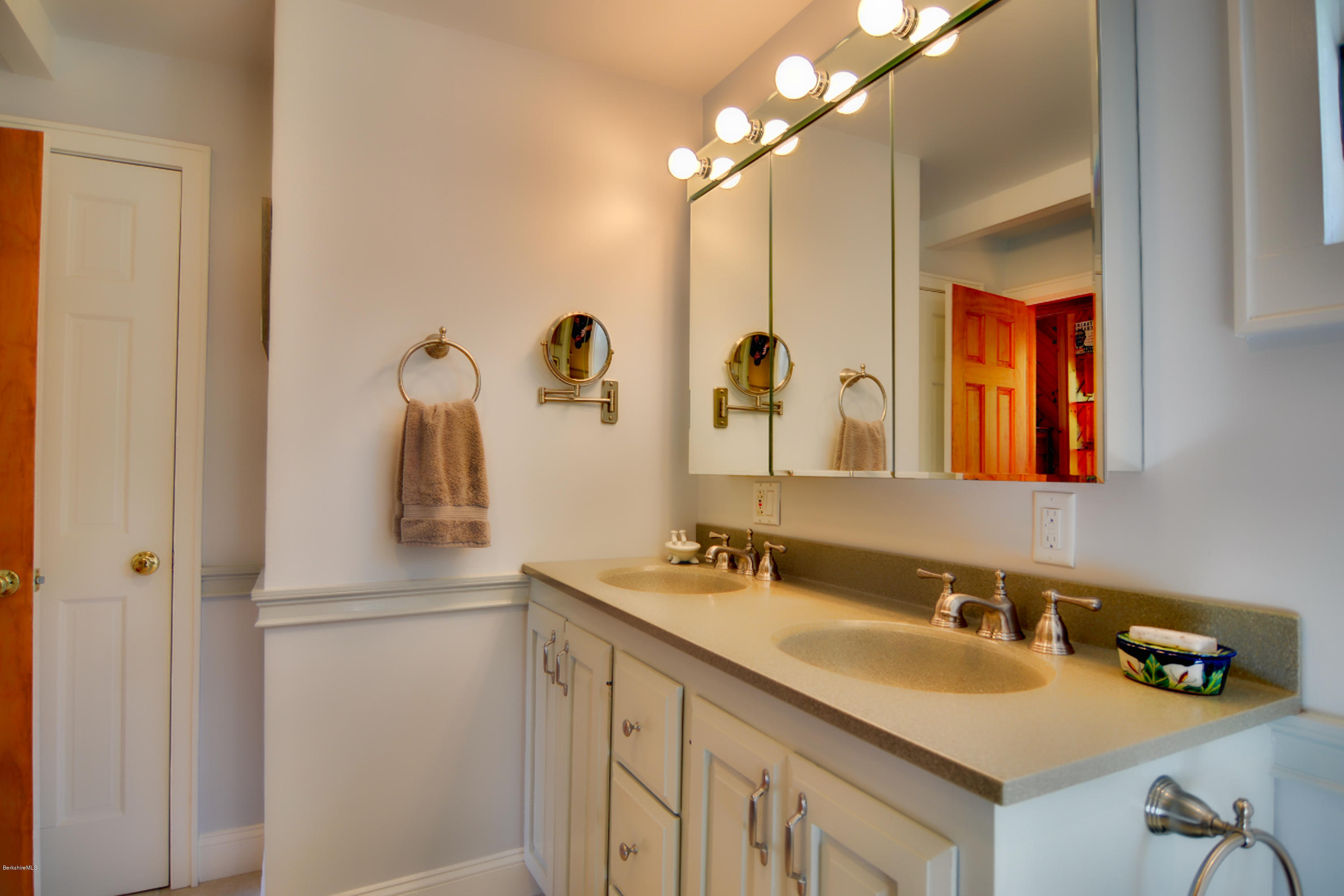 2231 Hancock Road Hancock, MA 01267 - Photo 28 of 39 a bathroom with a sink and a mirror