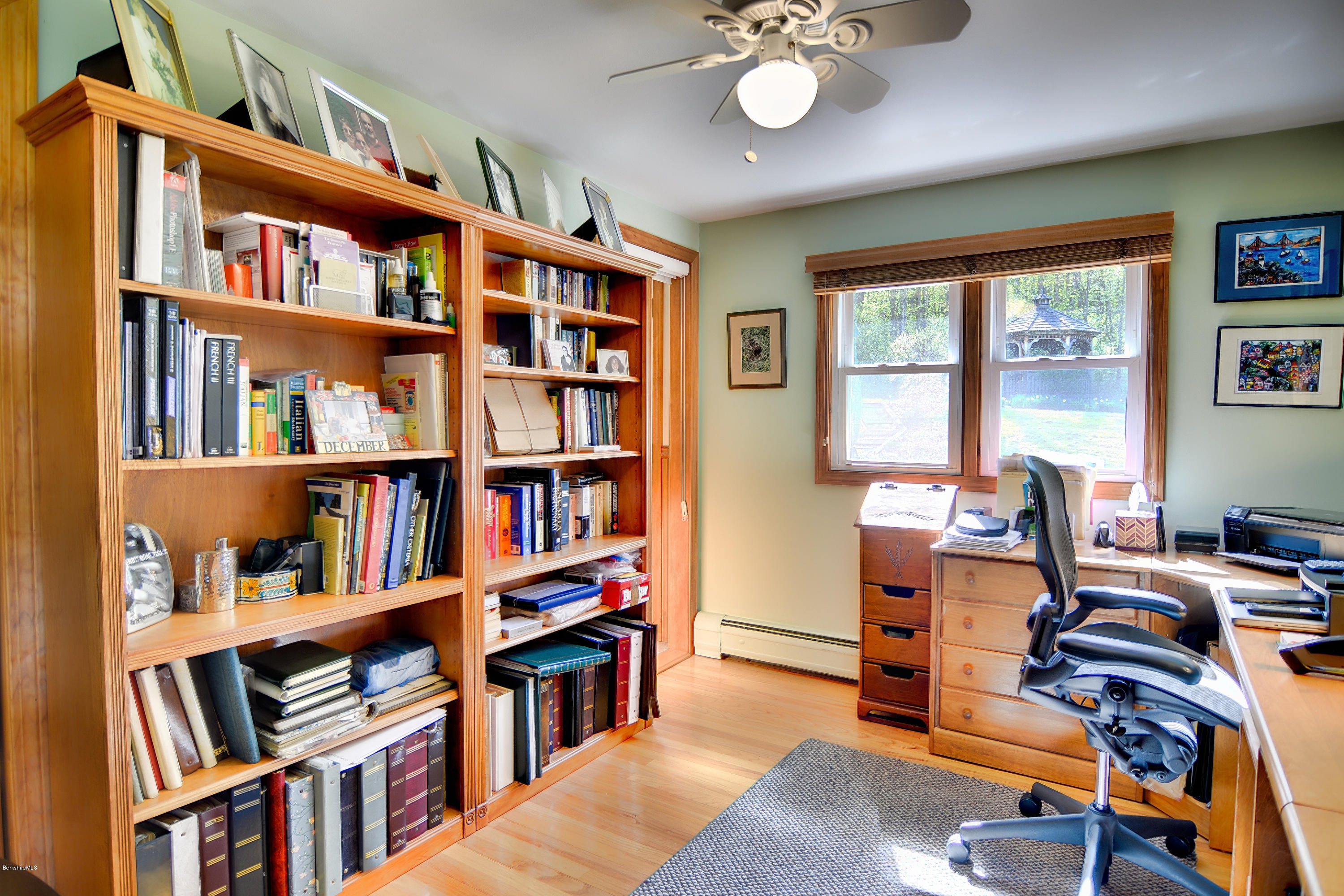 2231 Hancock Road Hancock, MA 01267 - Photo 32 of 39 a view of a workspace with bookshelf