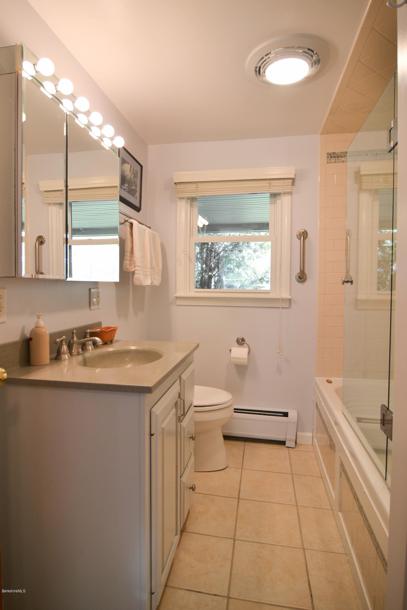 2231 Hancock Road Hancock, MA 01267 - Photo 35 of 39 a bathroom with a granite countertop sink a toilet and bathtub