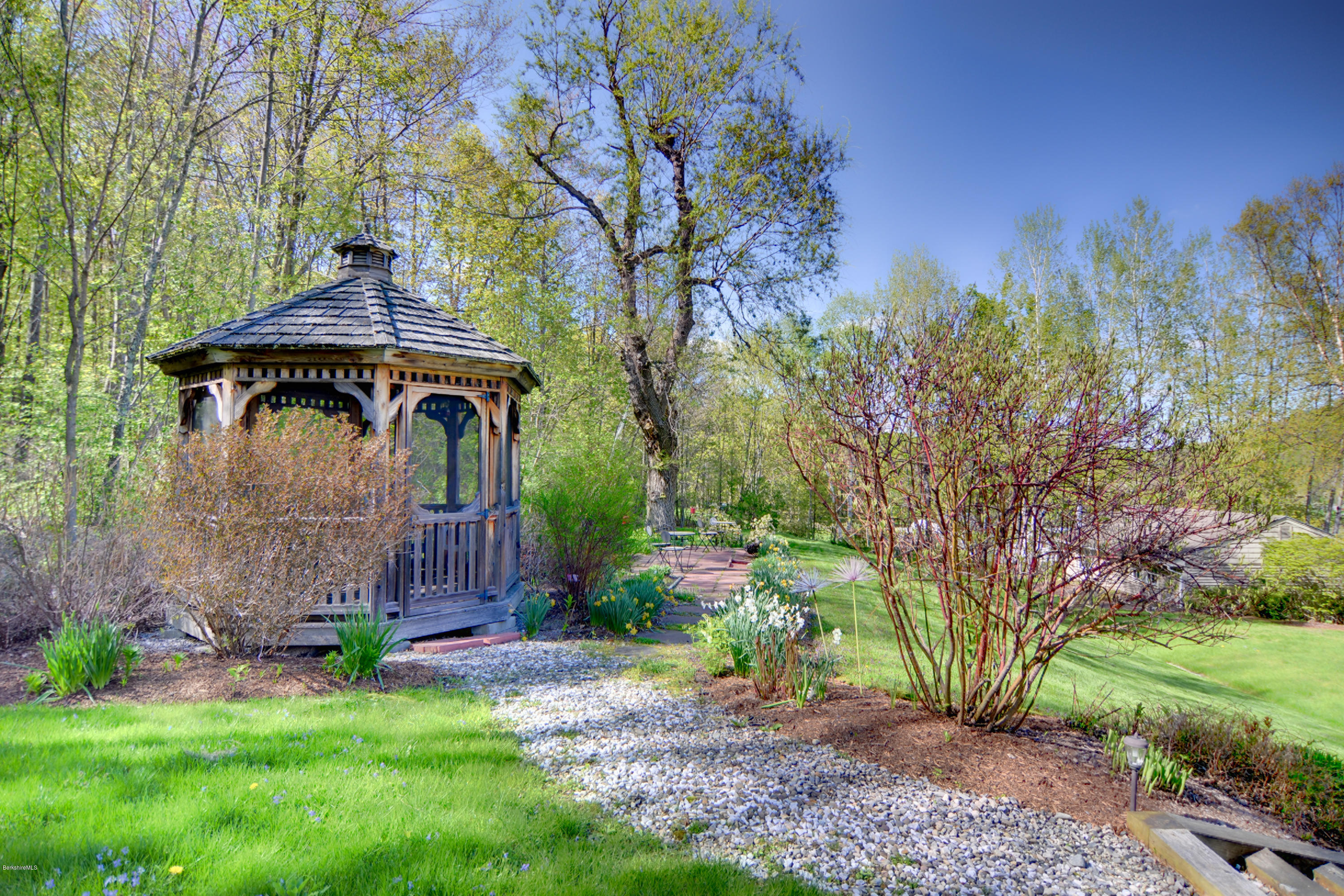 2231 Hancock Road Hancock, MA 01267 - Photo 37 of 39 a front view of a house with garden