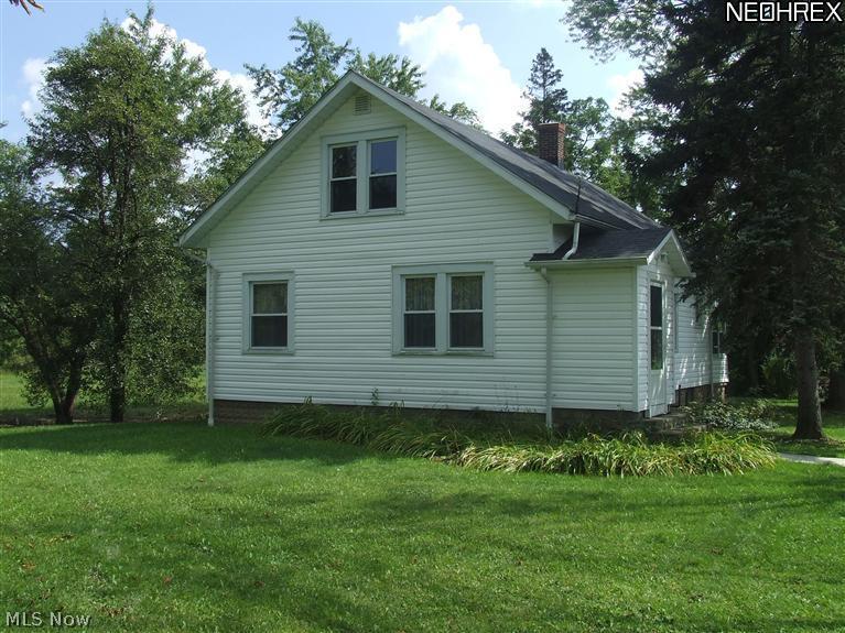 12259 Butternut Road Newbury, OH 44065 - Photo 1 of 21 Welcome to this delightful farmhouse on 29 gorgeous acres. Many updates including septic, siding, windows, electrical service and wiring. Gas is available at the street.