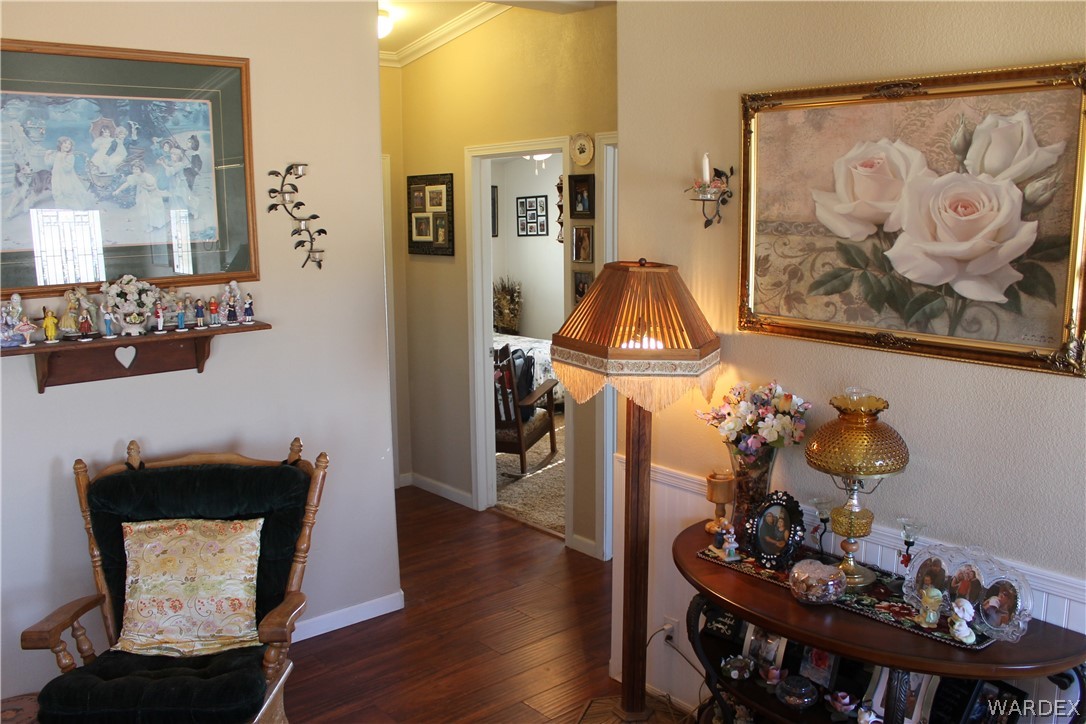 4198 Estrella Road Golden Valley, AZ 86413 - Photo 3 of 50 a living room with furniture and wooden floor