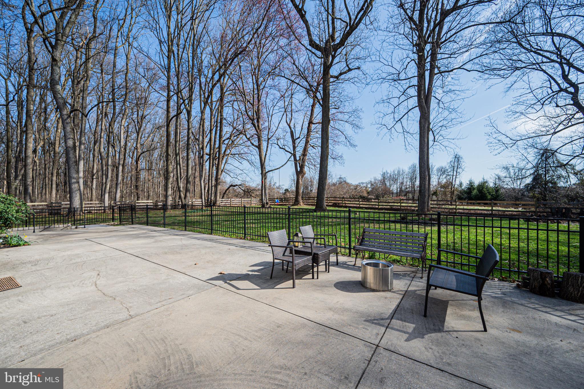 2705 Tallowtree Road Windsor Mill, MD 21244 - Photo 52 of 63 Backyard patio fenced in
