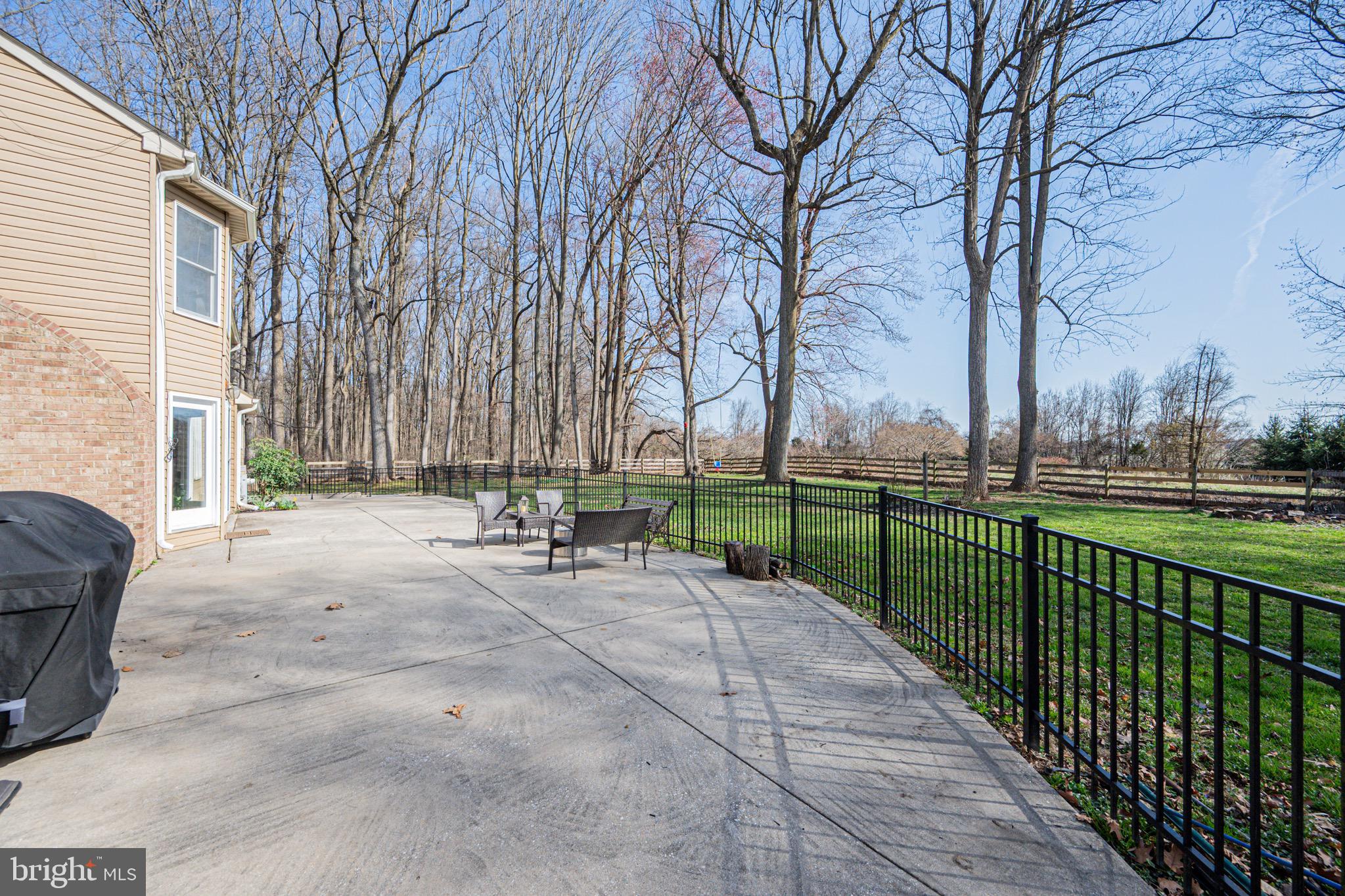2705 Tallowtree Road Windsor Mill, MD 21244 - Photo 54 of 63 Full length of house patio & plenty of yard space