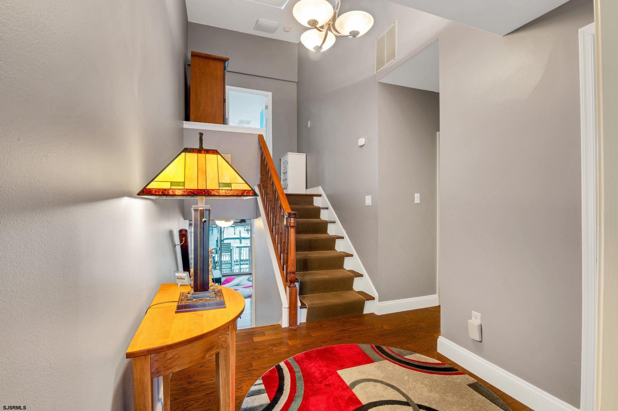 504 Harbour Cove, Unit 504 Somers Point, NJ 08244 - Photo 21 of 30 a view of entryway and hall with wooden floor