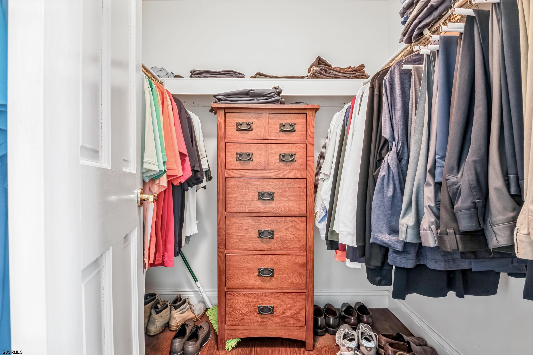 504 Harbour Cove, Unit 504 Somers Point, NJ 08244 - Photo 23 of 30 a view of walk in closet with clothes and shoes