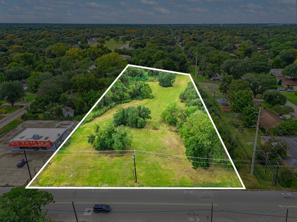 0 Bayou Road La Marque, TX 77568 - Photo 2 of 9 a view of a yard with potted plants