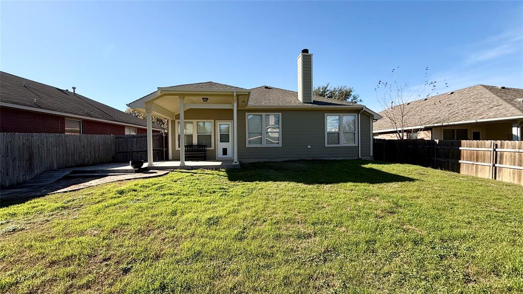 1021 Terrace View Drive Fort Worth, TX 76108 - Photo 21 of 22 a front view of a house with a yard