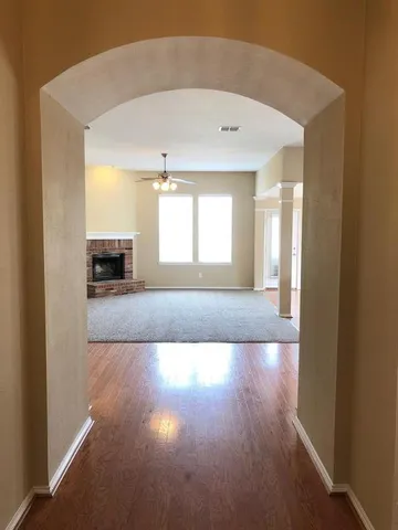 a view of a livingroom and a window