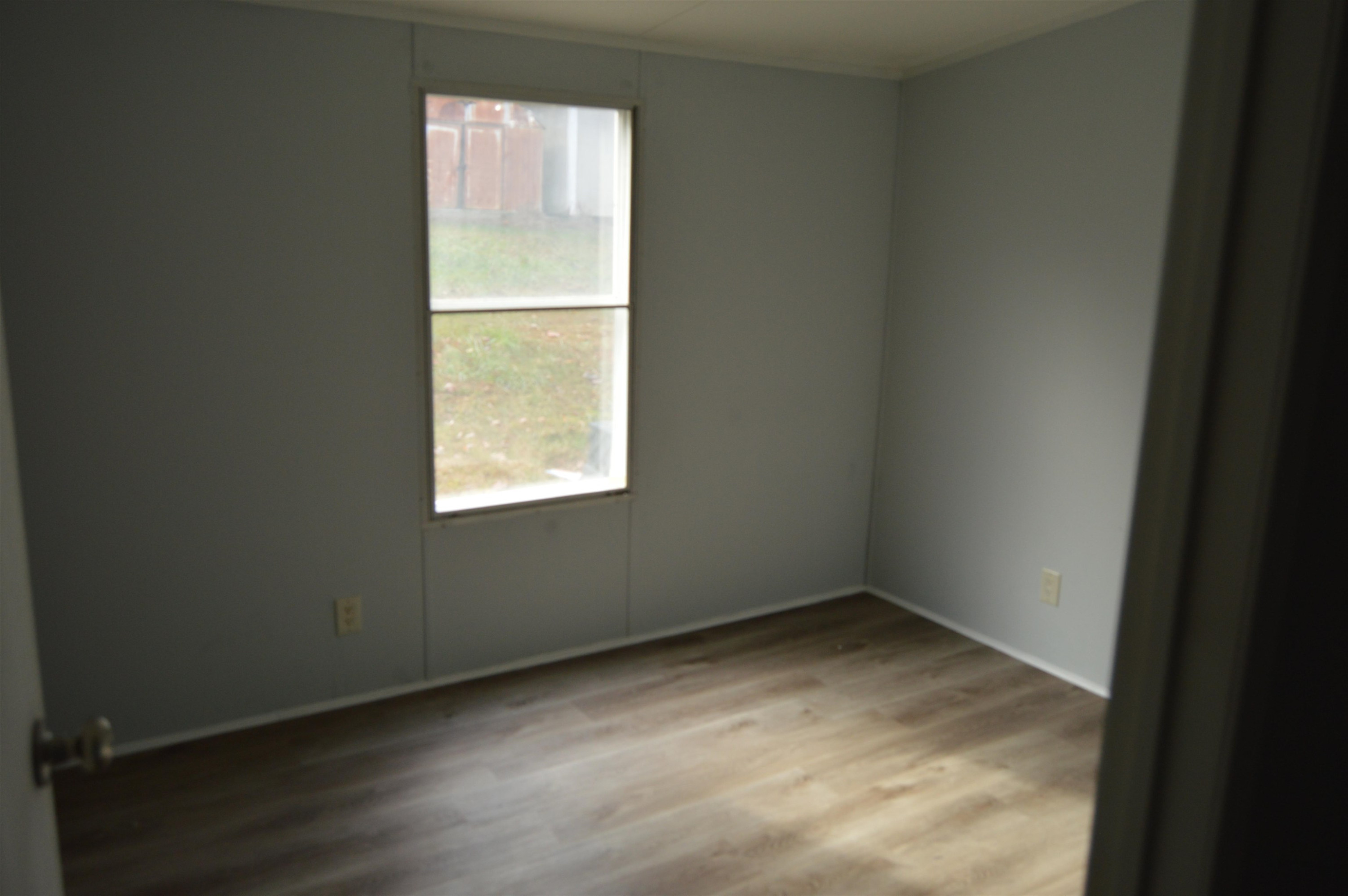 879 Holeman Ashley Road Timberlake, NC 27583 - Photo 9 of 9 a view of an empty room with a window