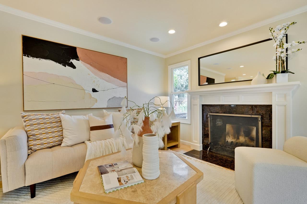 891 Humewick Way Sunnyvale, CA 94087 - Photo 11 of 45 a living room with furniture and a fireplace
