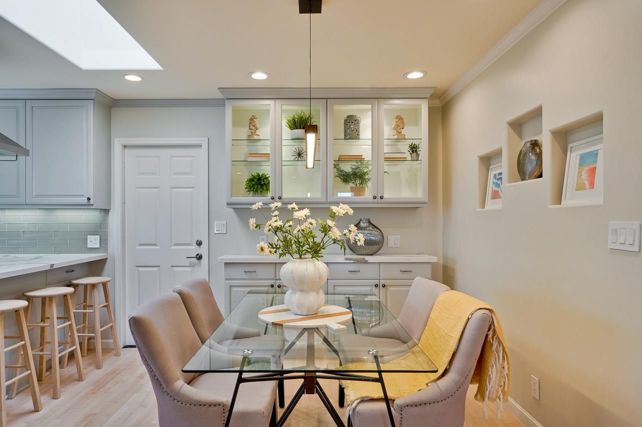 891 Humewick Way Sunnyvale, CA 94087 - Photo 14 of 45 a view of a dining room with furniture window and outside view