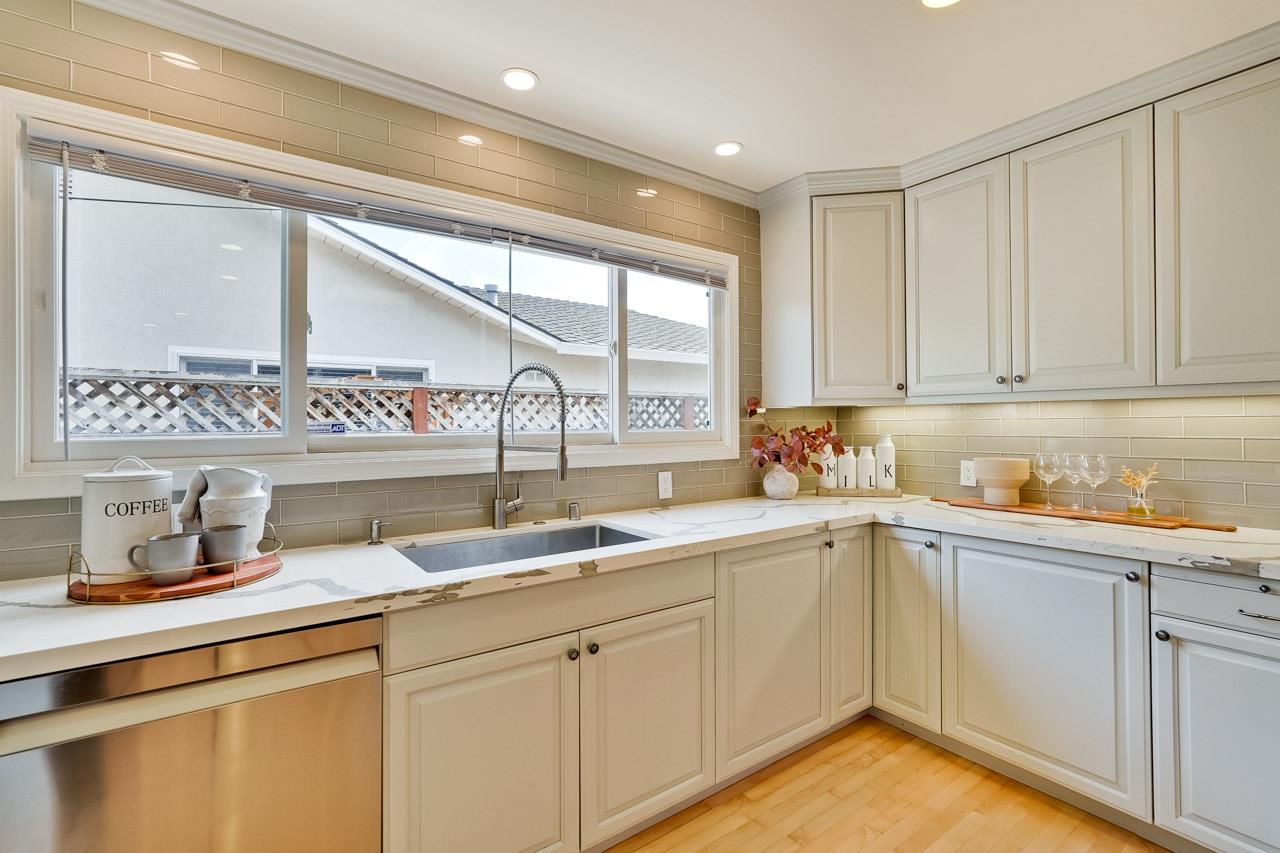891 Humewick Way Sunnyvale, CA 94087 - Photo 17 of 45 a kitchen with a sink cabinets and window