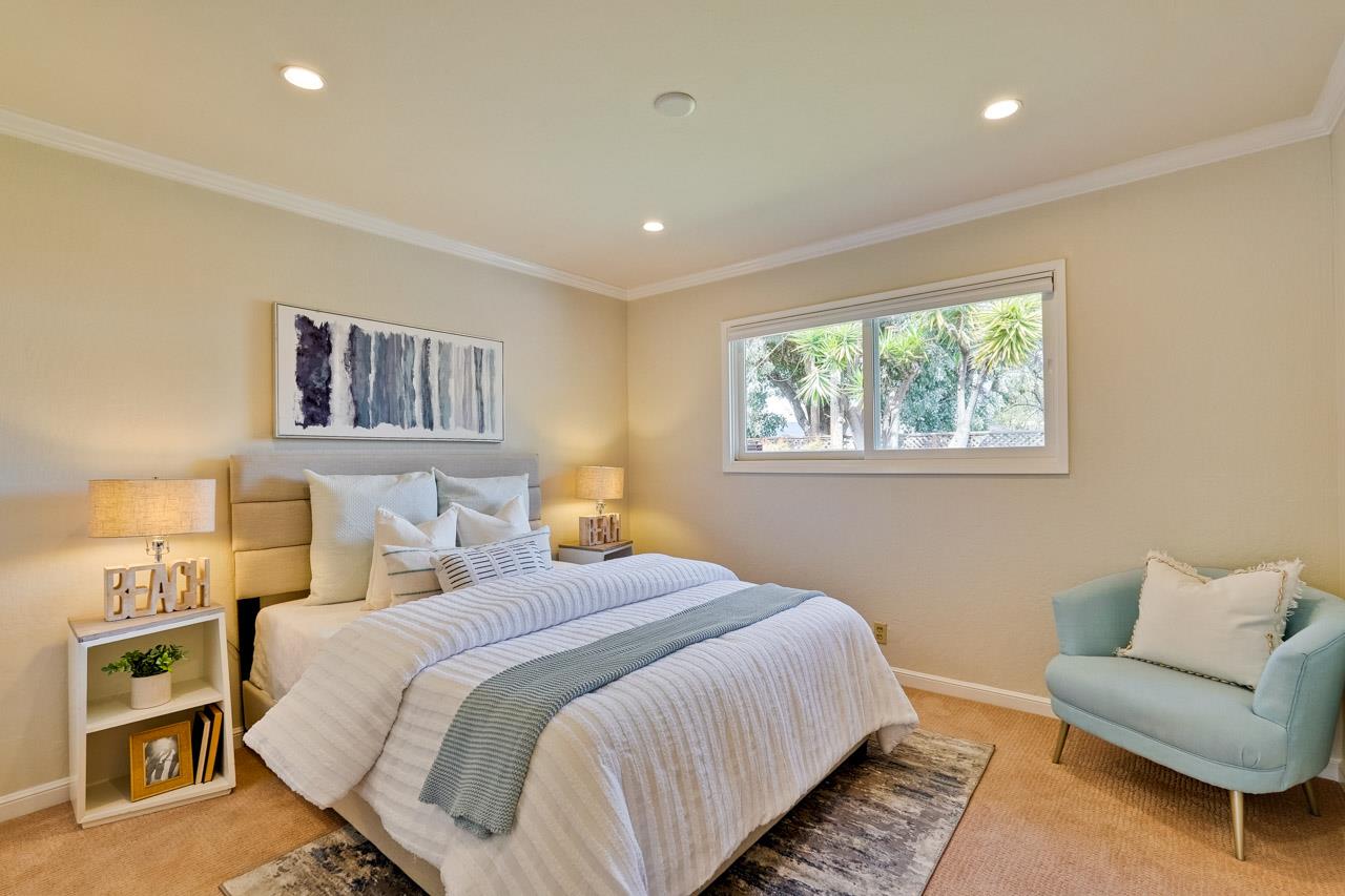 891 Humewick Way Sunnyvale, CA 94087 - Photo 20 of 45 a bedroom with a bed and a couch