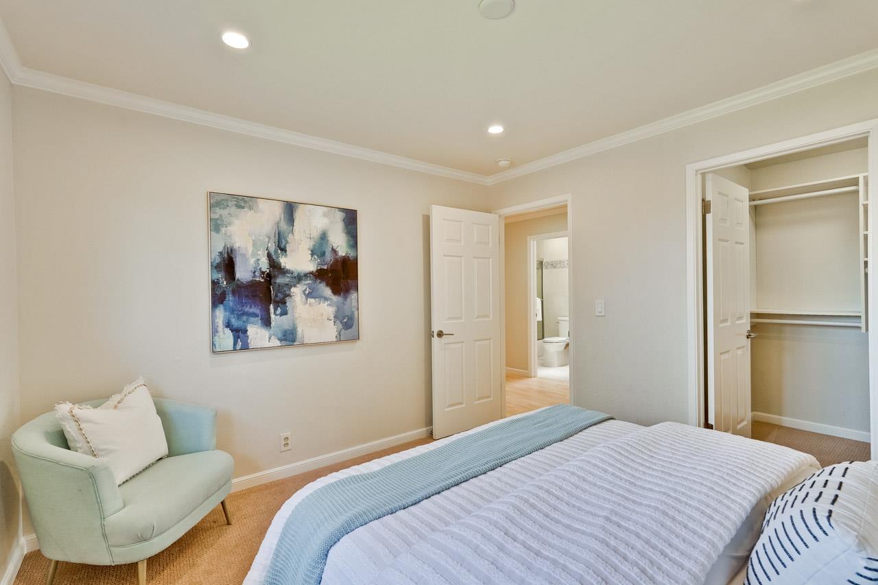 891 Humewick Way Sunnyvale, CA 94087 - Photo 22 of 45 a bedroom with a bed and a couch
