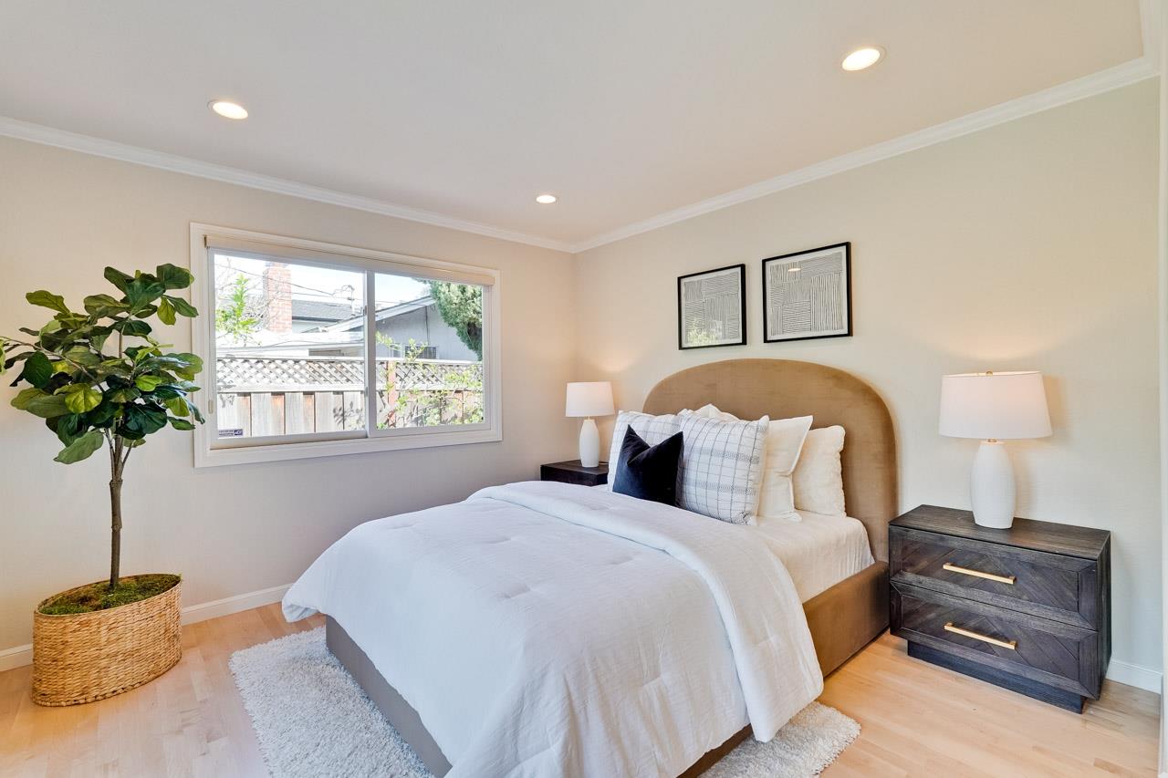 891 Humewick Way Sunnyvale, CA 94087 - Photo 27 of 45 a bedroom with a bed and a window
