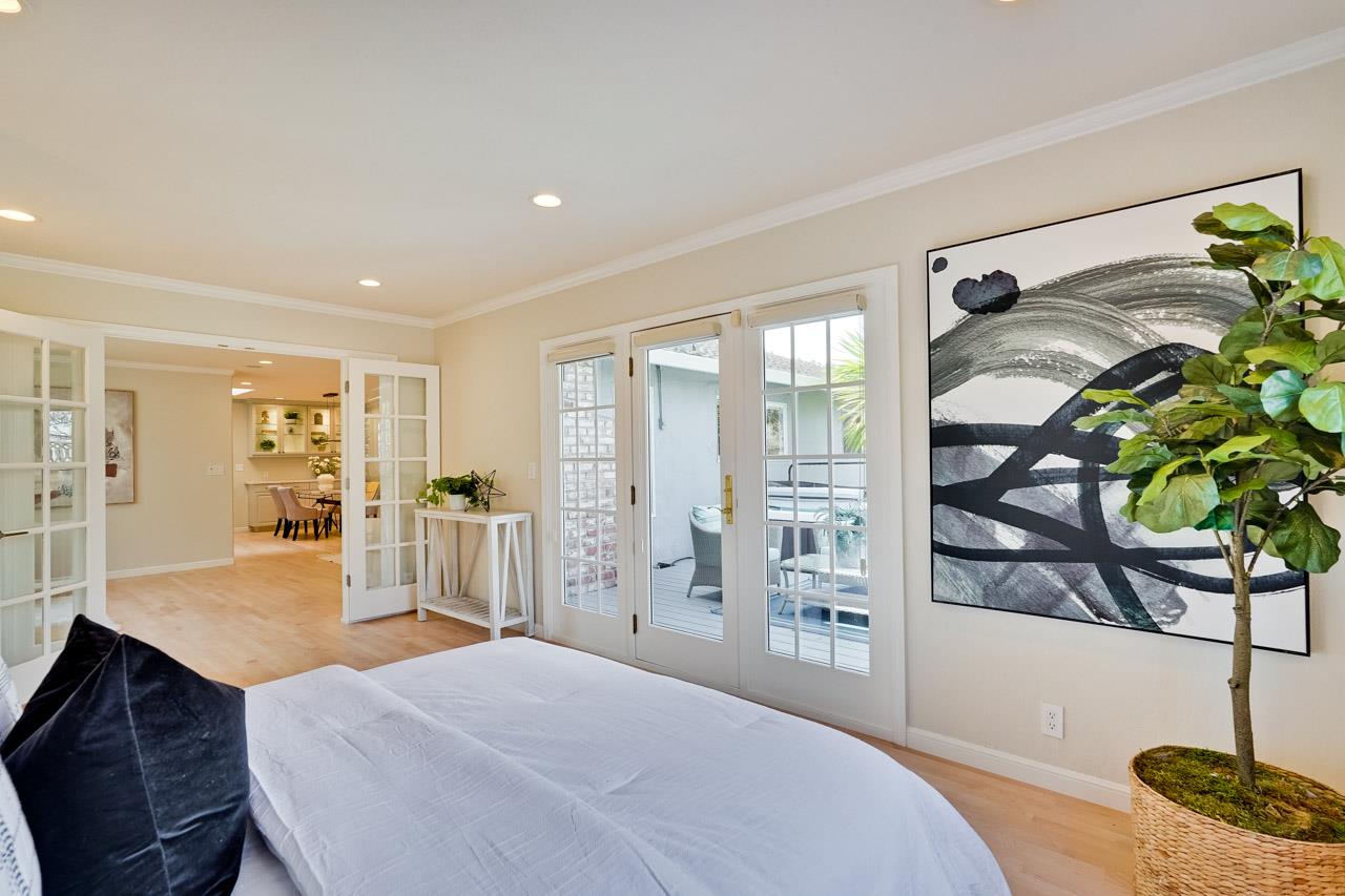 891 Humewick Way Sunnyvale, CA 94087 - Photo 29 of 45 a living room with furniture a potted plant and a wooden floor