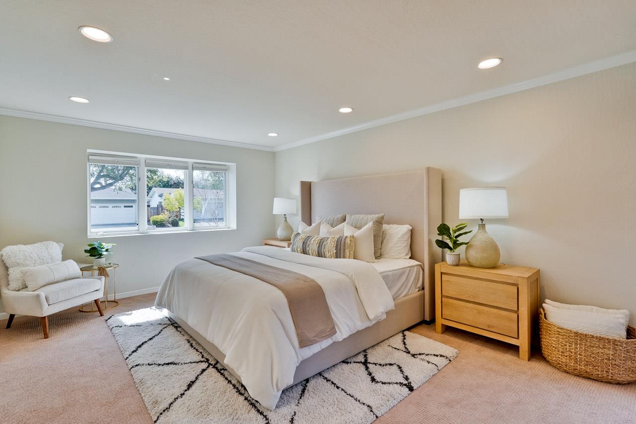 891 Humewick Way Sunnyvale, CA 94087 - Photo 32 of 45 a bedroom with a bed and a couch
