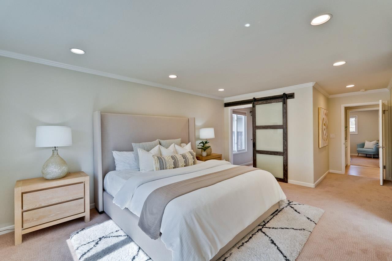 891 Humewick Way Sunnyvale, CA 94087 - Photo 33 of 45 a bedroom with a bed and a lamp