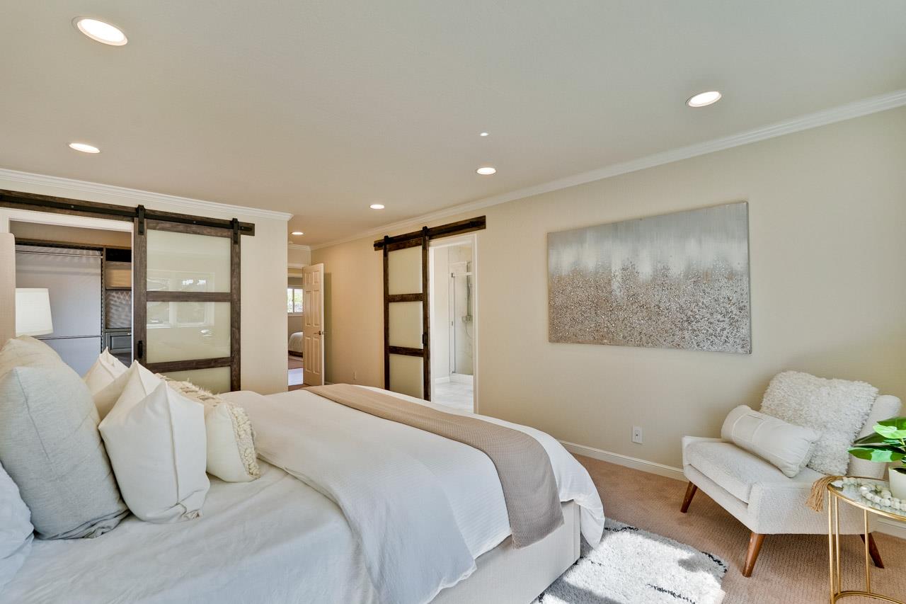 891 Humewick Way Sunnyvale, CA 94087 - Photo 34 of 45 a bedroom with a bed and a chair