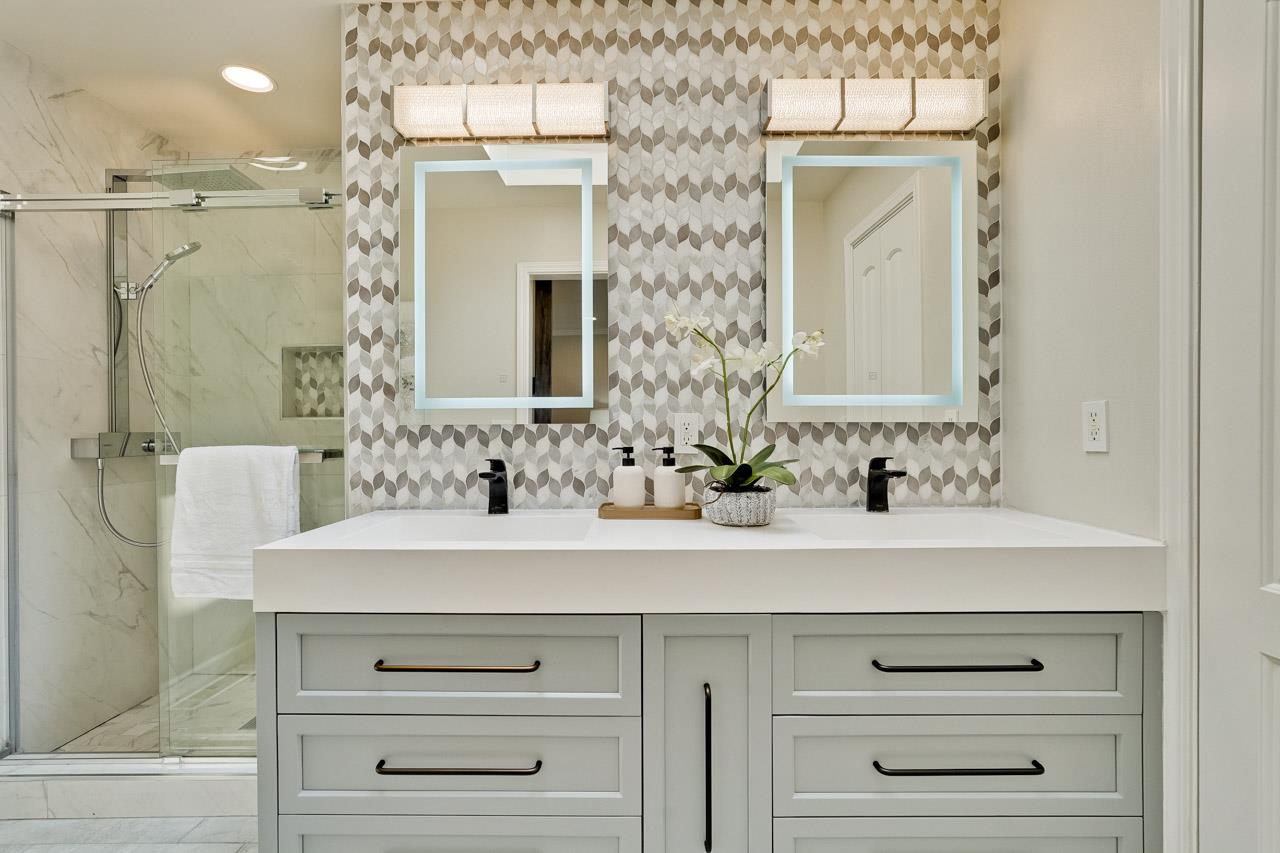 891 Humewick Way Sunnyvale, CA 94087 - Photo 36 of 45 a bathroom with a sink vanity and a mirror