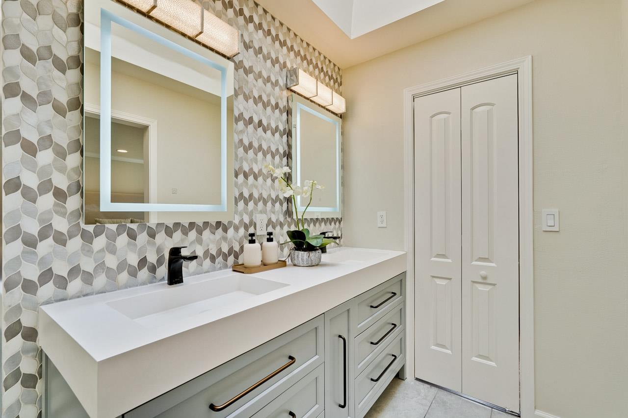 891 Humewick Way Sunnyvale, CA 94087 - Photo 37 of 45 a bathroom with a sink and a mirror